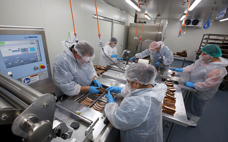 Processing the meat at Texas BBQ Foods